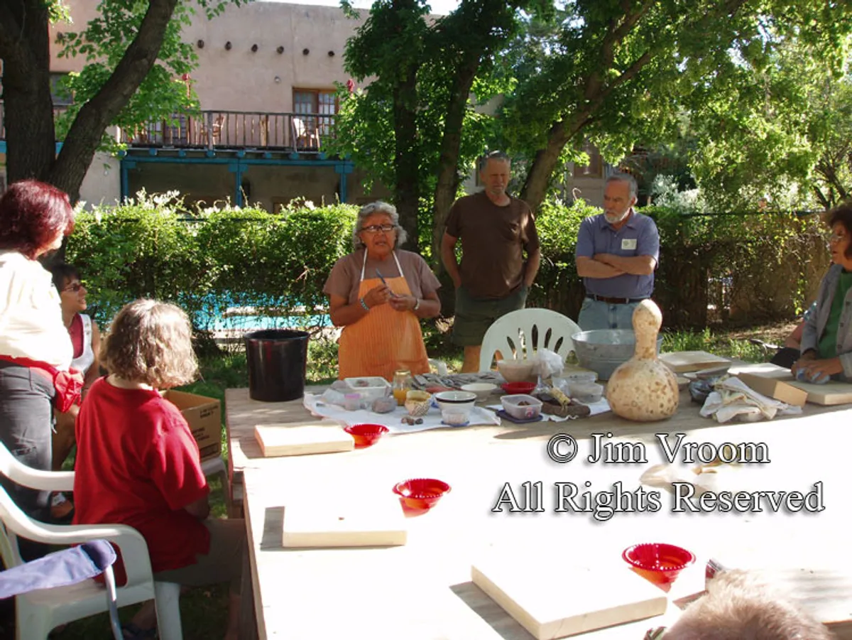 Classes with teachers  under the shade of ancient cottonwoods on the grounds of a local estate.