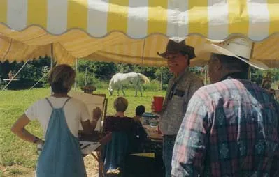 Social gathering while horse munches grass