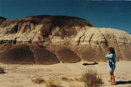 A student photographing "The Black Place"