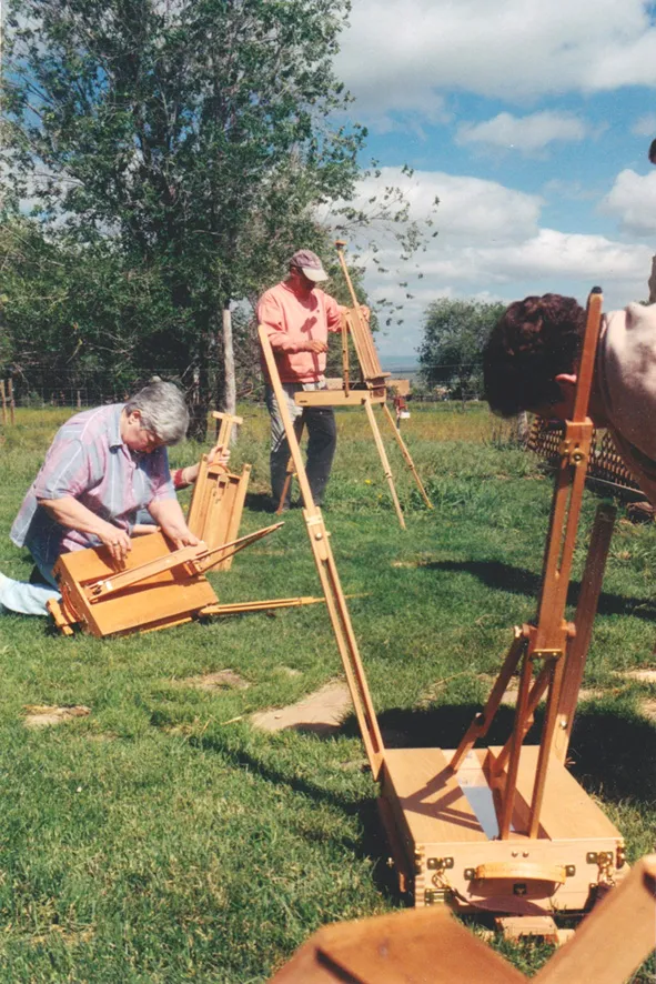 beginning students learn how to set up their french easels
