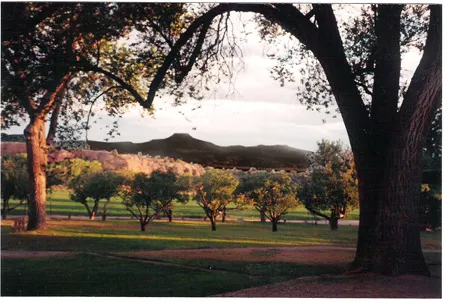 Ghost Ranch with Pedernal in the background. Pedernal is the mountain Georgia O'Keeffe painted many, many times. When asked if she thought she owned it, she said: "Well, God told me if I painted it enough, I could have it."