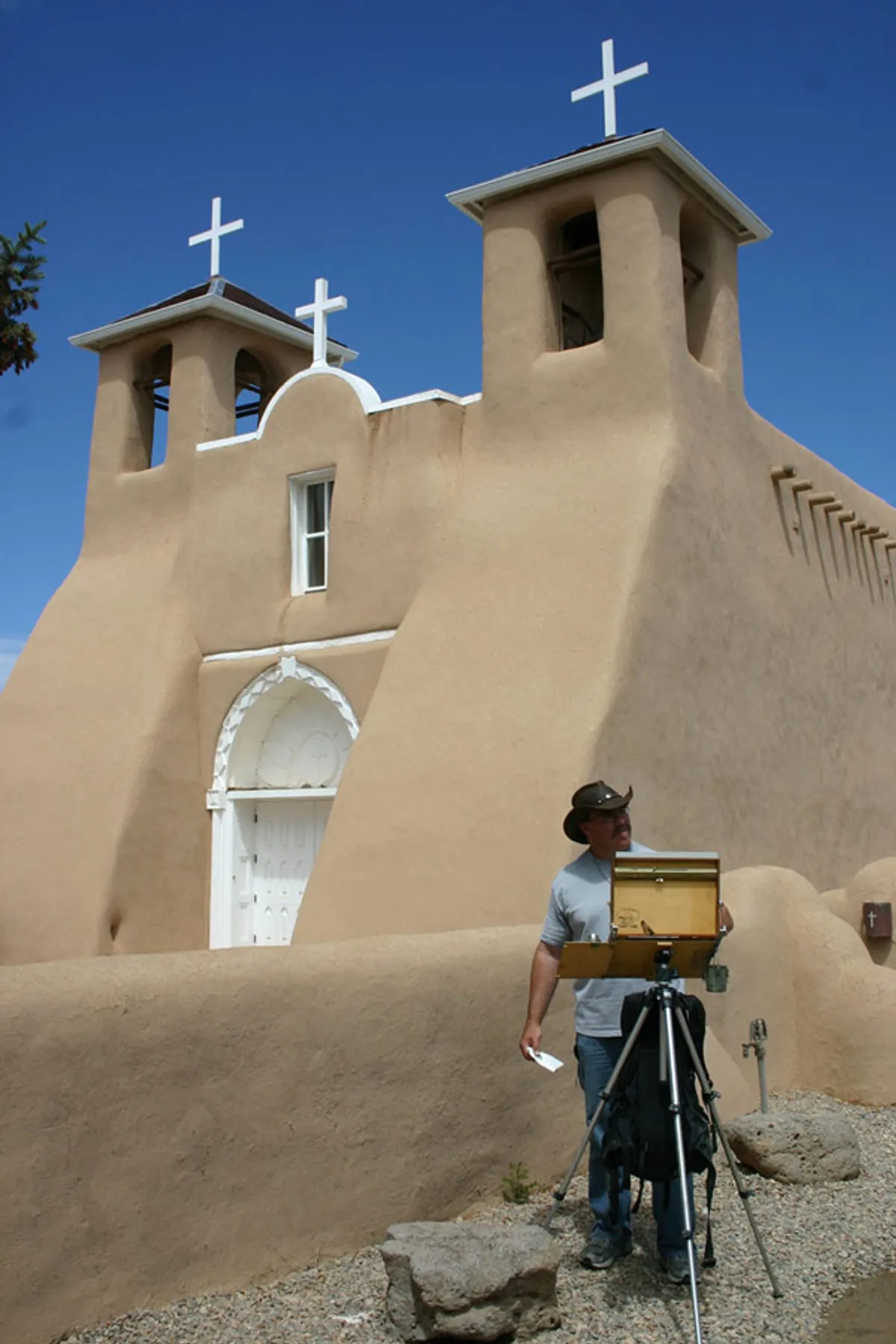 Painting at an easel at Saint Francis of Assisi