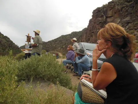 Teacher demonstrating a painting above the Rio Grande River while students gather around to watch. This is a rare teacher who can talk during his demos and students are welcome to ask questions... A great way to learn.