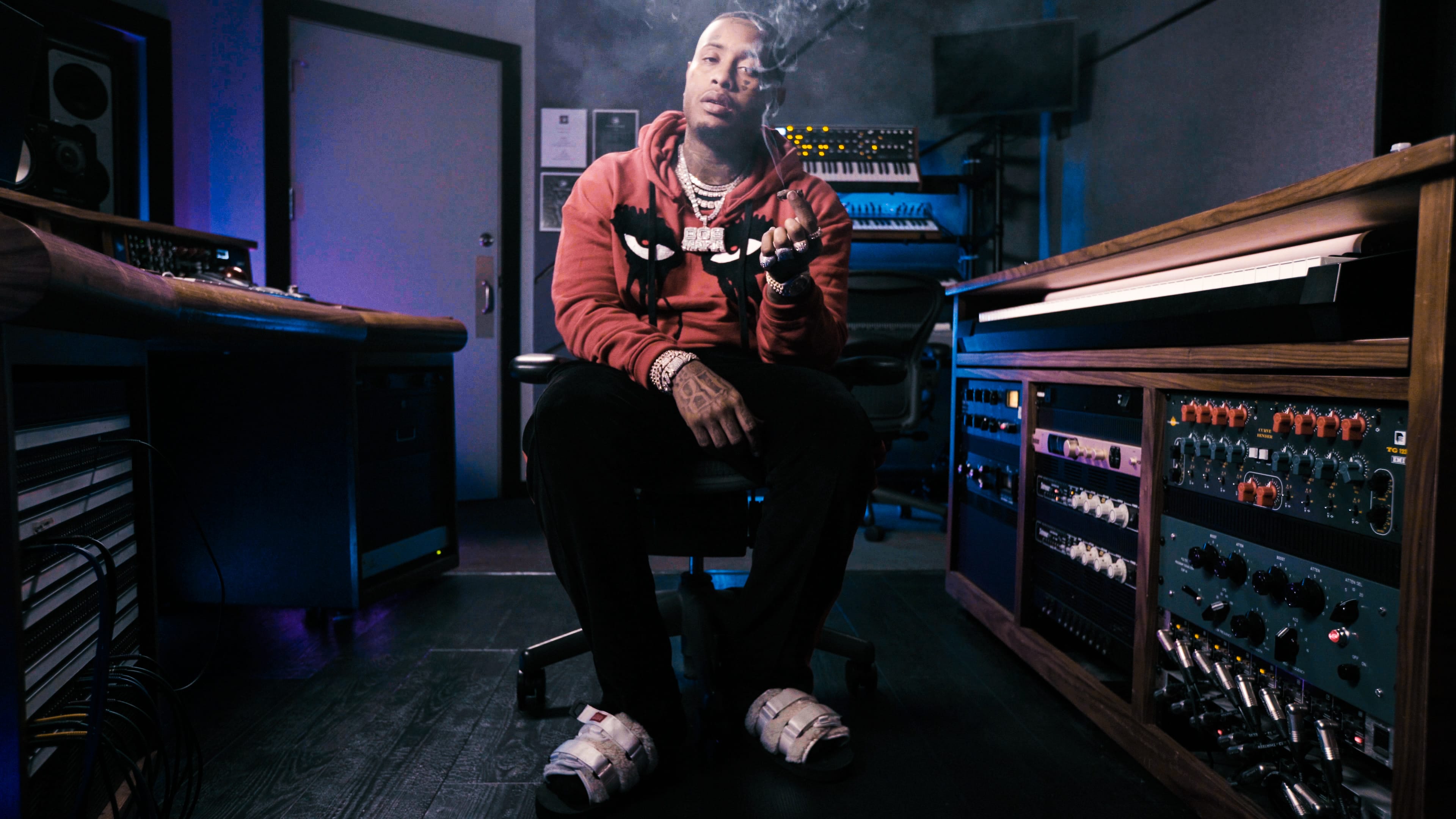 Southside in the studio with colorful synth and sampler hardware