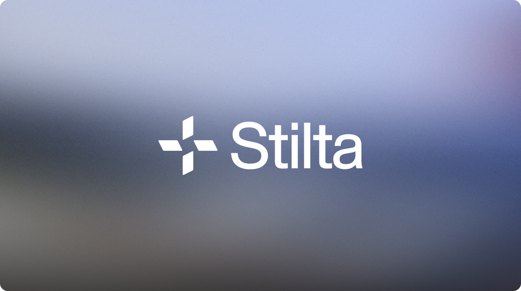 The new Stilta logo in white on a soft blue and grey gradient.