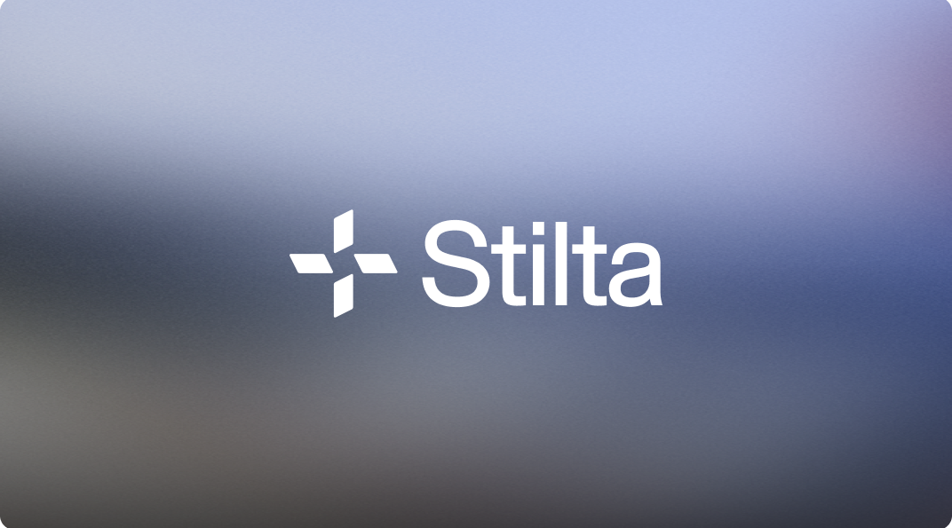 The new Stilta logo in white on a soft blue and grey gradient.