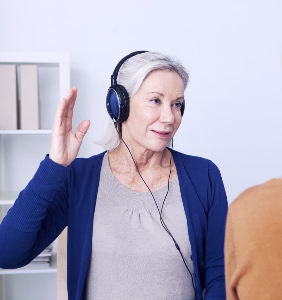 lady using a digital hearing aid