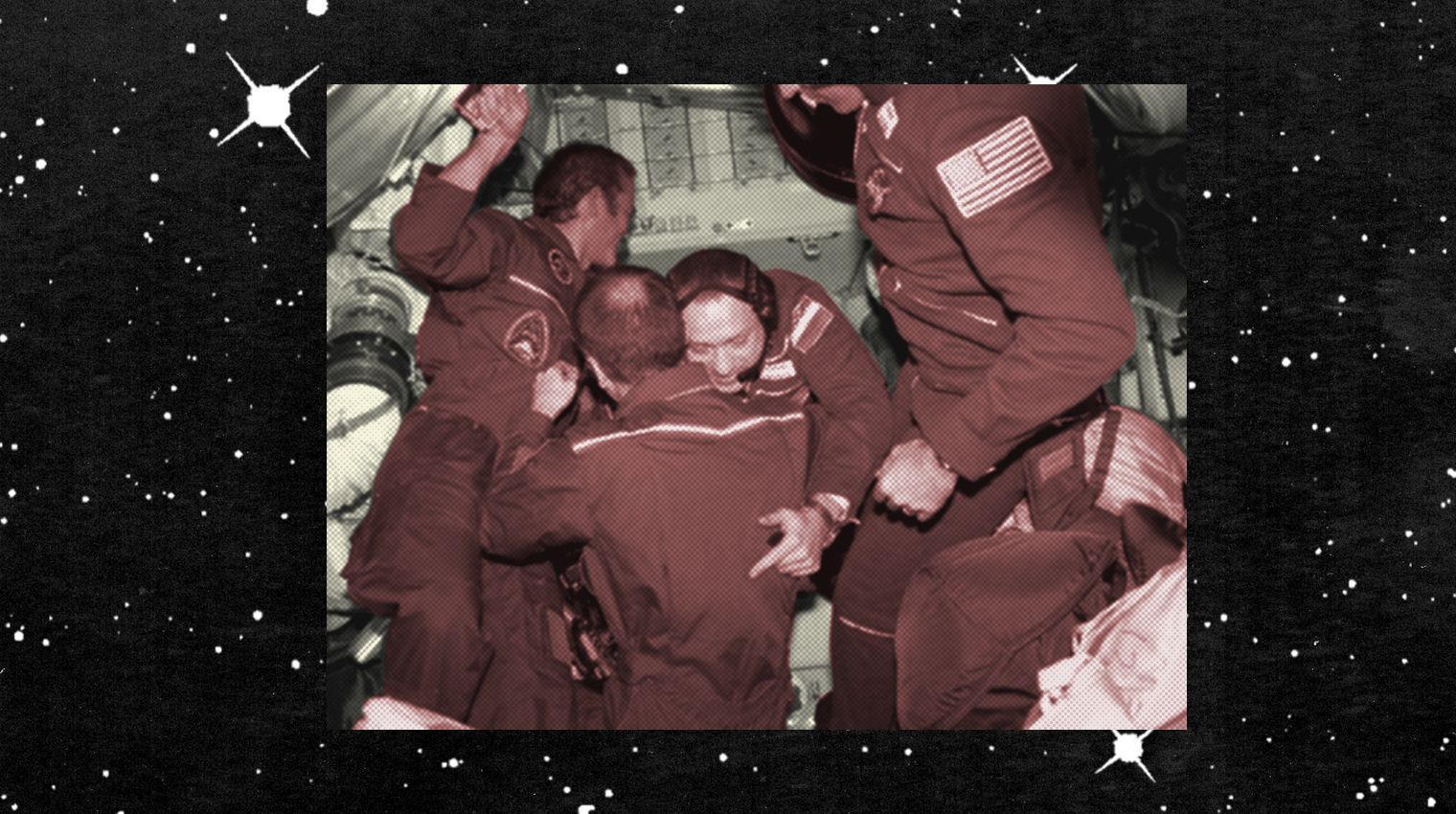 astronauts hug in space