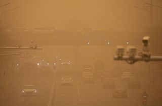 what caused yellow skies in Beijing