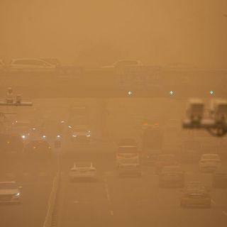 what caused yellow skies in Beijing