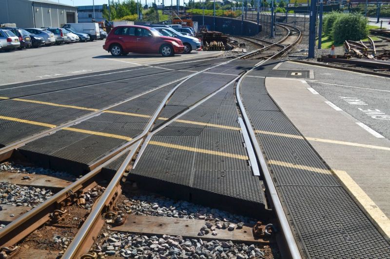 Durable depot level crossing