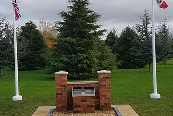 Fibreglass flagpoles with hinged base