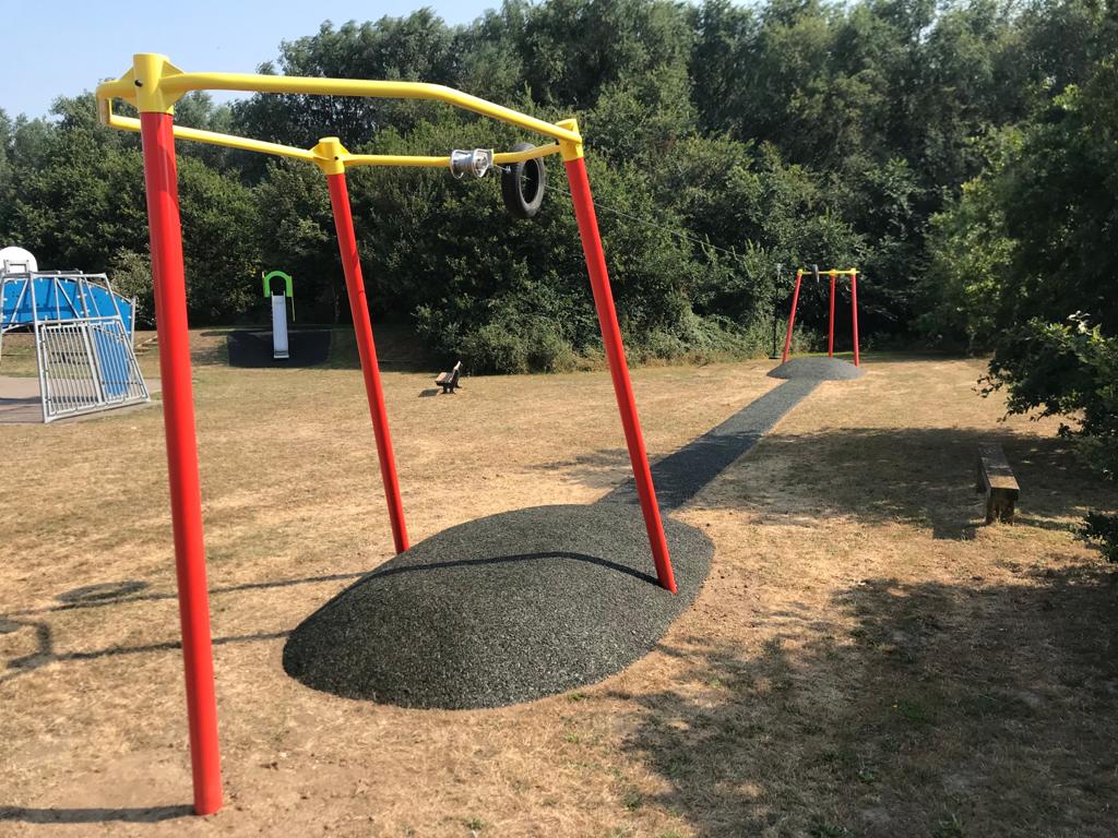 Playquip Halo design with Bonded mulch ramps  
