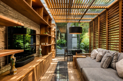 Living room with natural light and garden views in Vista Hermosa residence