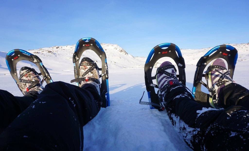 Snowshoeing across the snowy Arctic landscape near Honningsvåg.