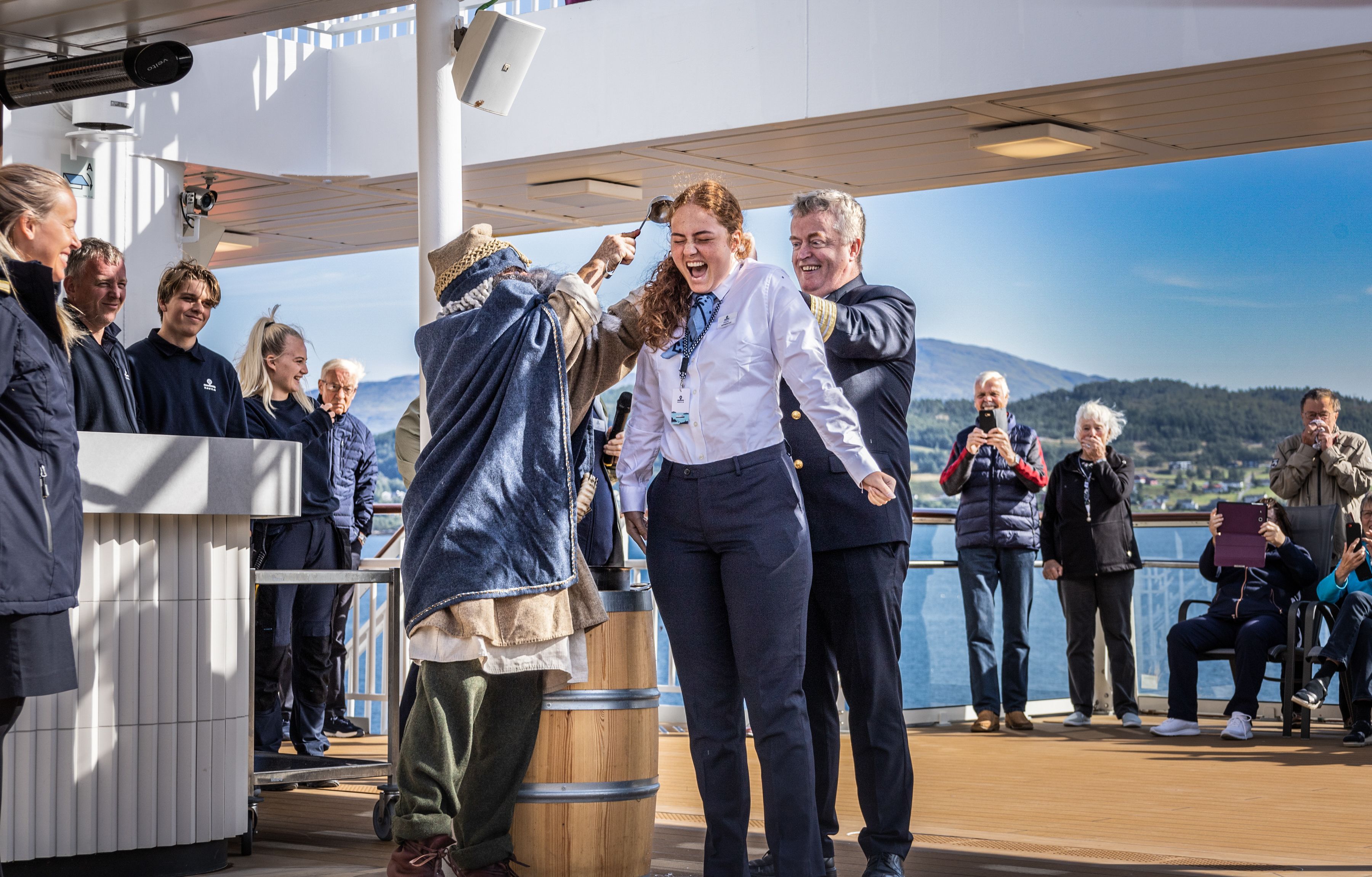 Crew are baptised with ice cold water during Arctic Circle ceremony.