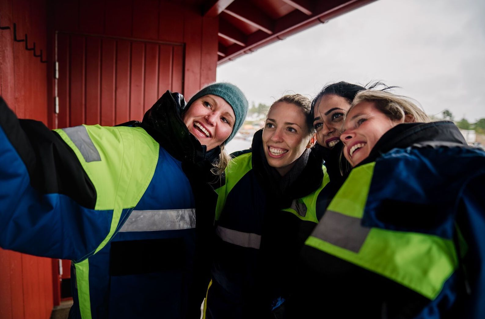 Group of people taking a selfie in their RIB boat gear
