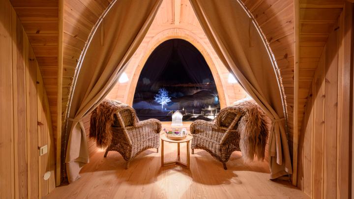 Guests enjoying lunch and a relaxing stay at Snowhotel Kirkenes in Arctic Norway.