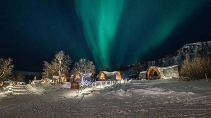 Relaxing Arctic evening at Snowhotel Kirkenes with sauna, local dining, and peaceful surroundings.