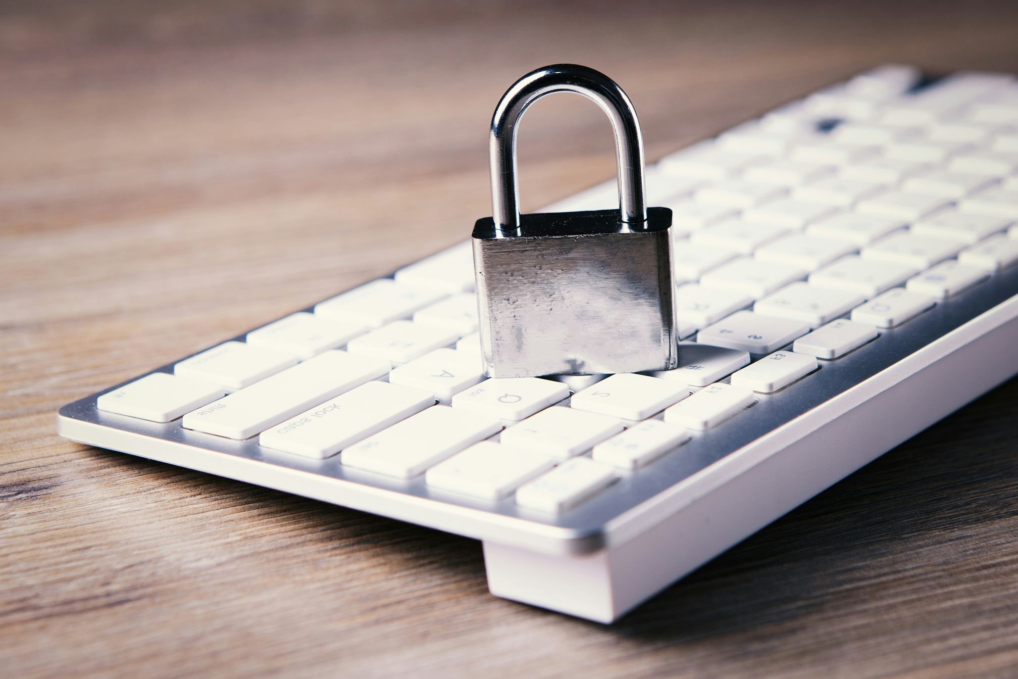 Photo by <a href="https://unsplash.com/@sasun1990?utm_source=unsplash&utm_medium=referral&utm_content=creditCopyText">Sasun Bughdaryan</a> on <a href="https://unsplash.com/photos/a-computer-keyboard-with-a-padlock-on-top-of-it-2T4l02ZYj-k?utm_source=unsplash&utm_medium=referral&utm_content=creditCopyText">Unsplash</a>