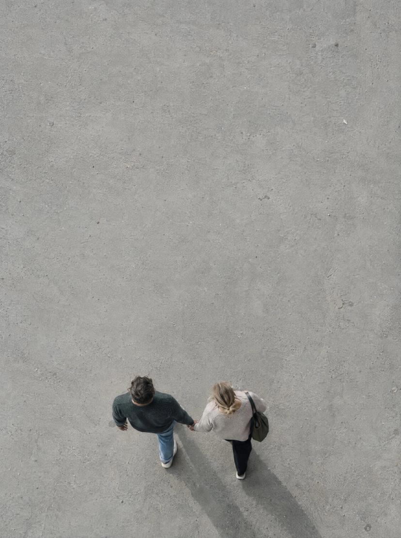 Two people walking side by side, seen from above