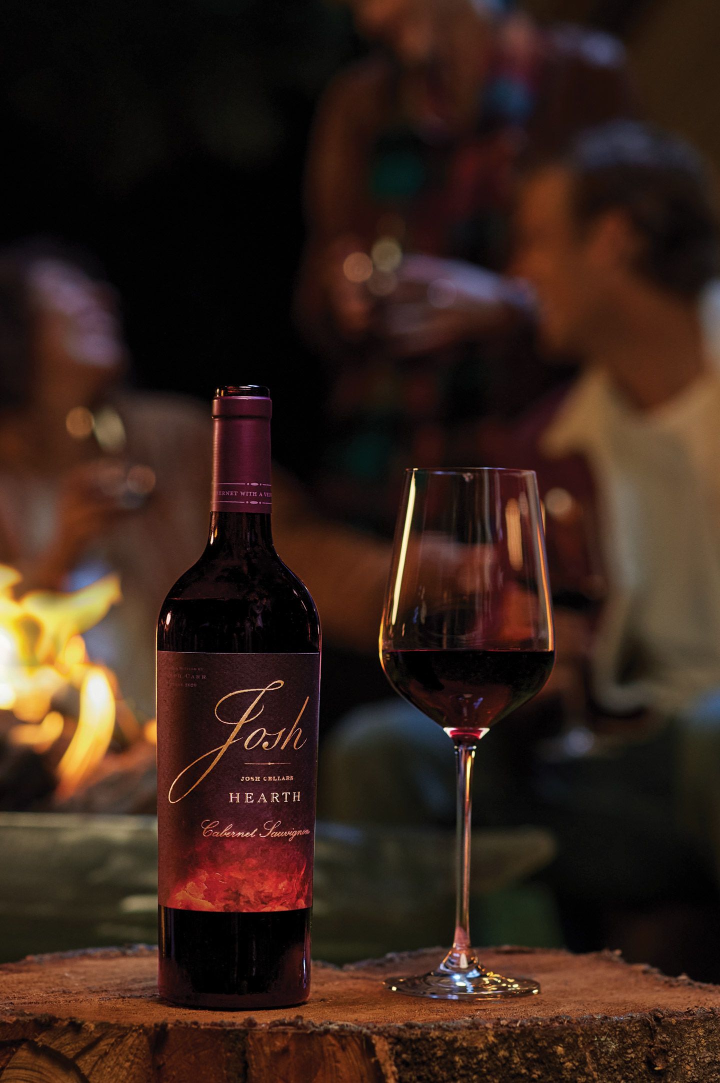 Josh Hearth wine bottle and glass fireside