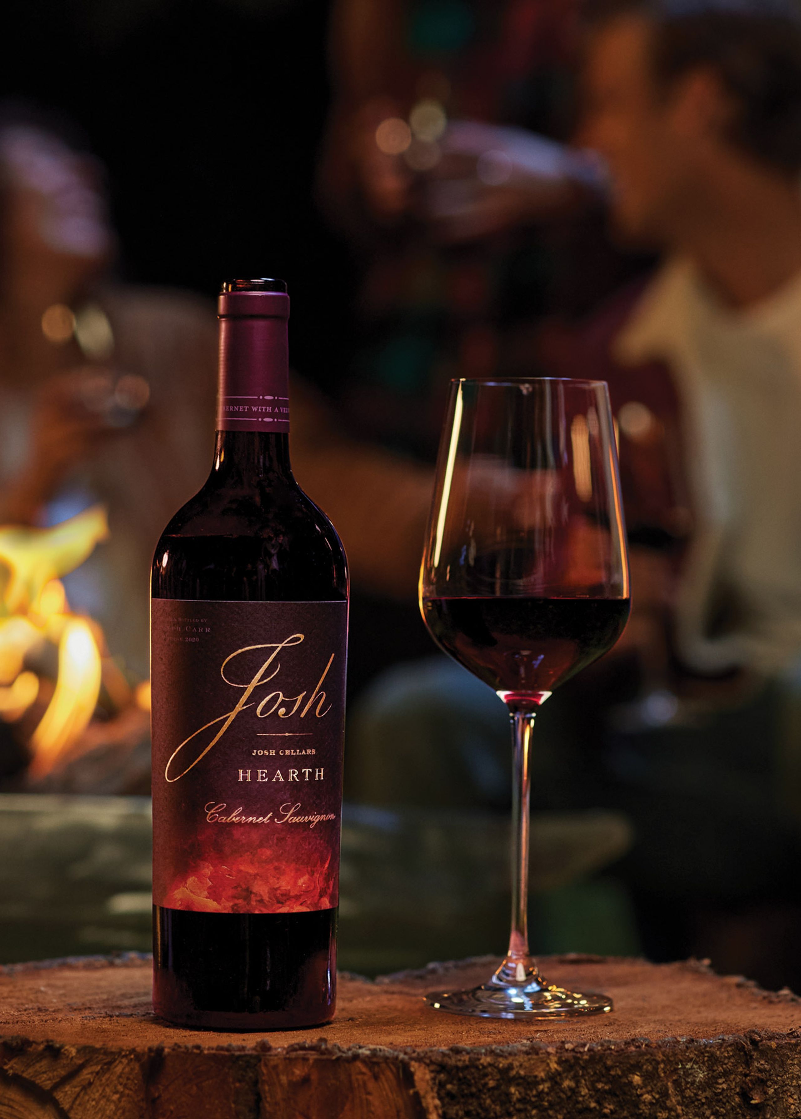 Josh Hearth wine bottle and glass fireside