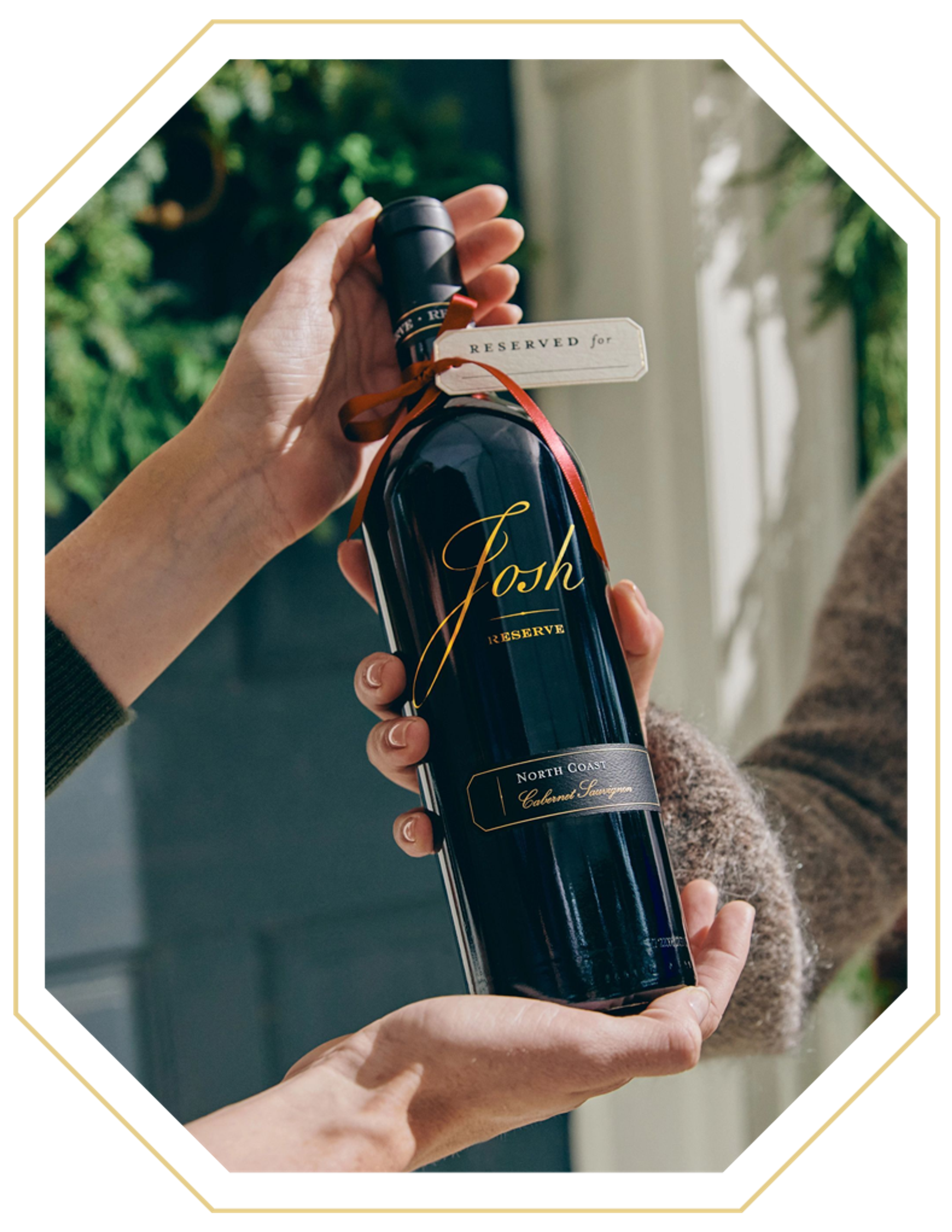 Josh Cellars Reserve wine being presented as a gift