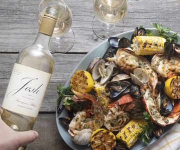 Josh Cellars lobster with wine bottle and glasses