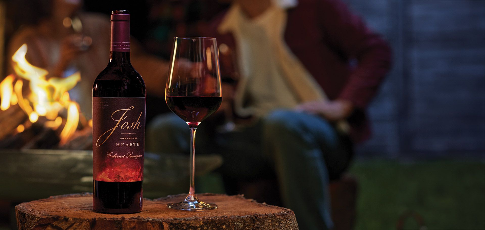 Josh Hearth wine bottle & glass fireside