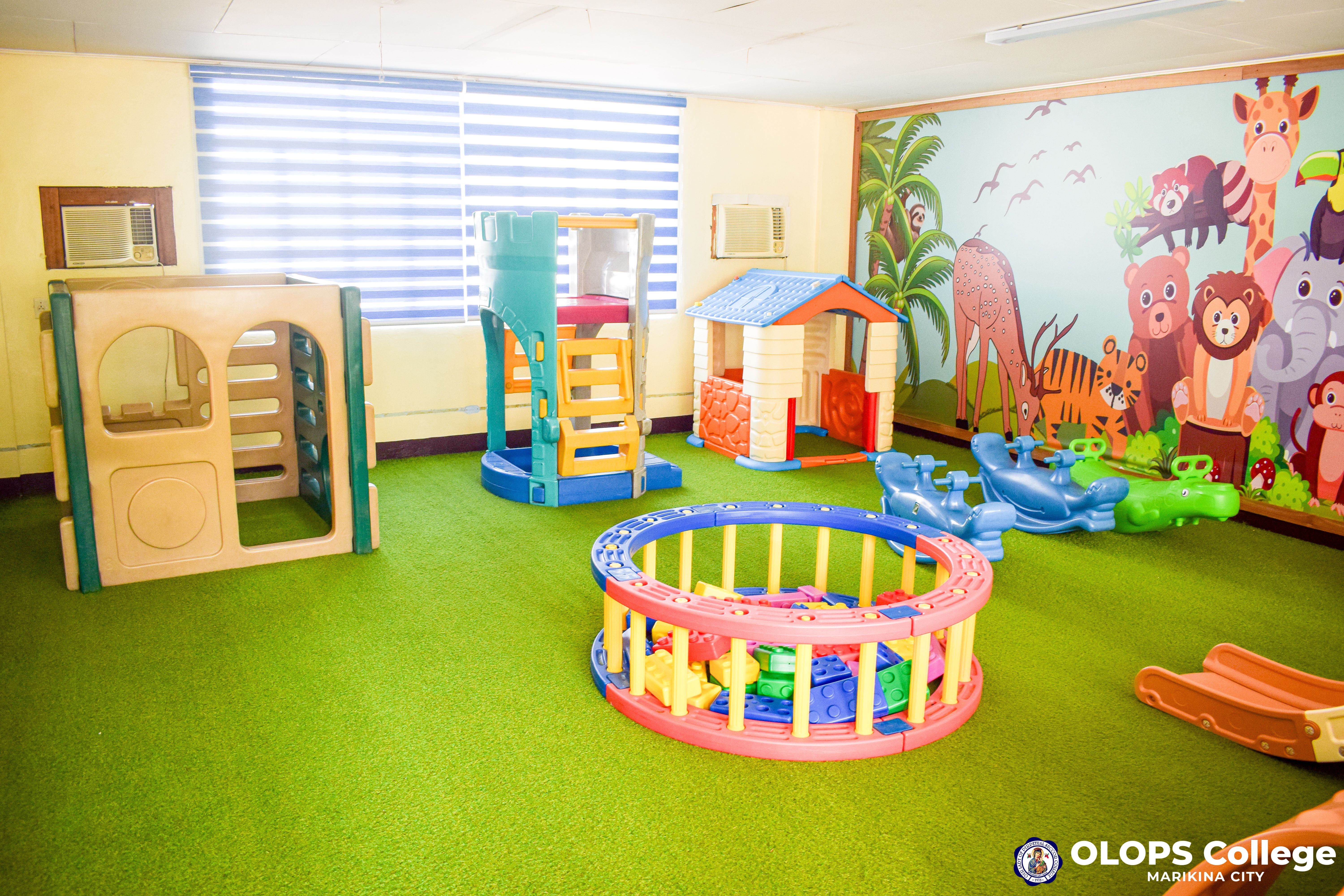 Secure preschool playground with rubberized safety flooring