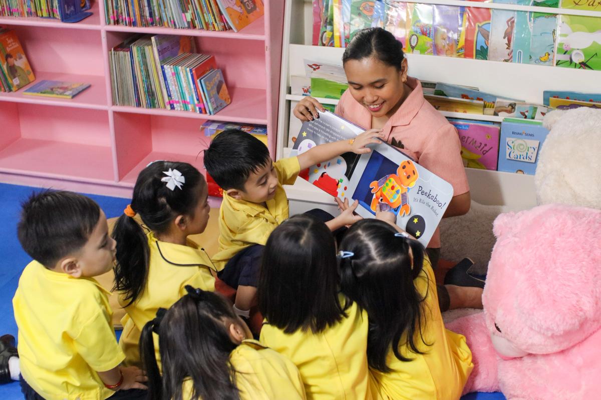 Preschool students studying