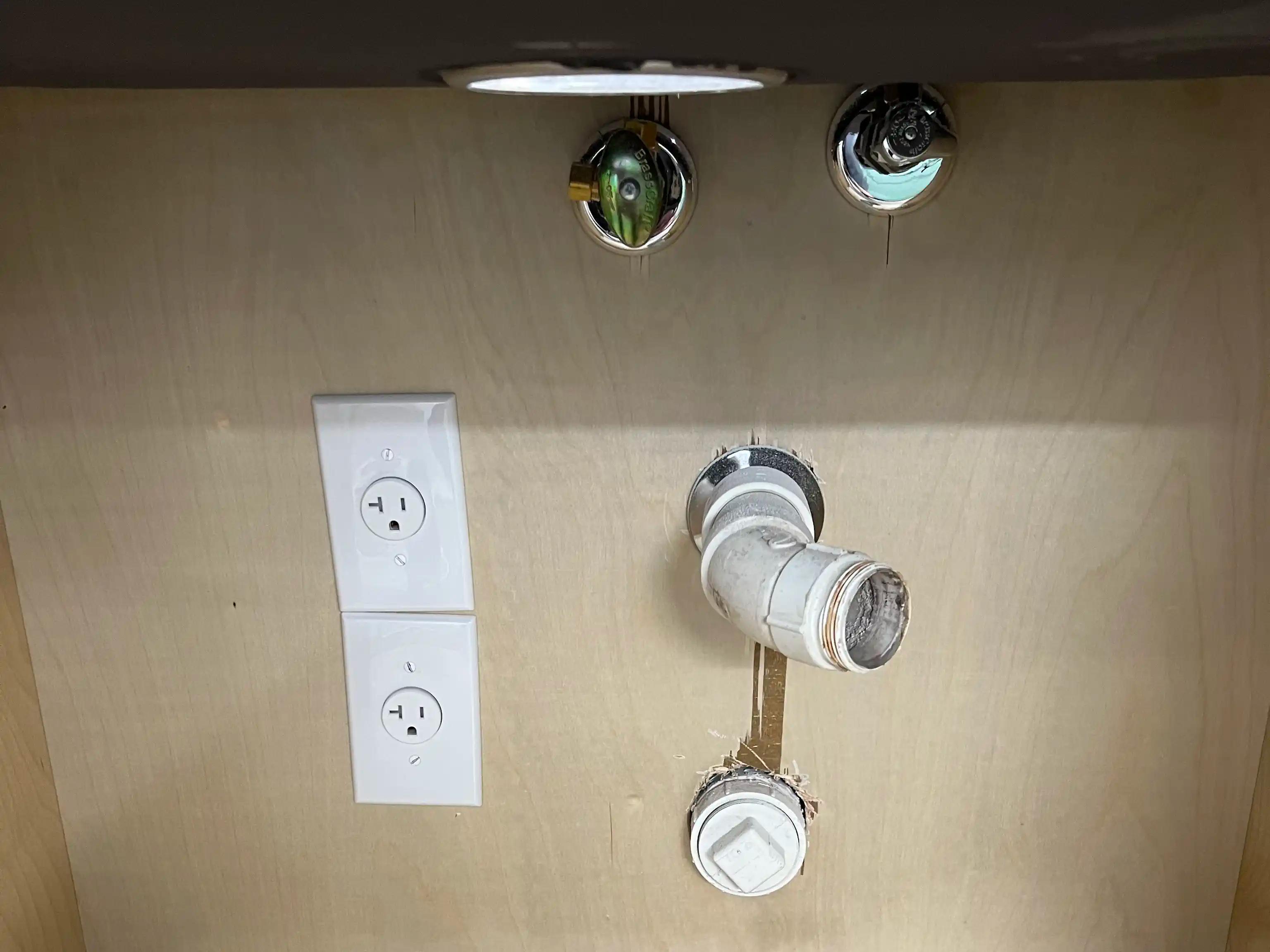 Plumbing work under sink