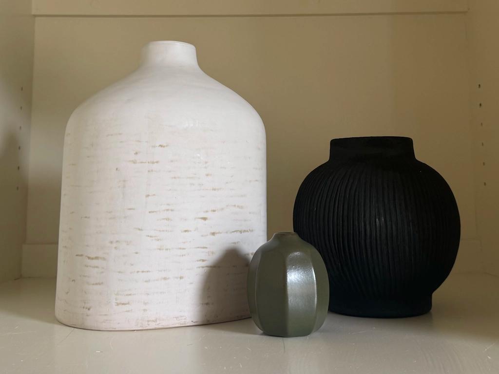Three vases next to each other