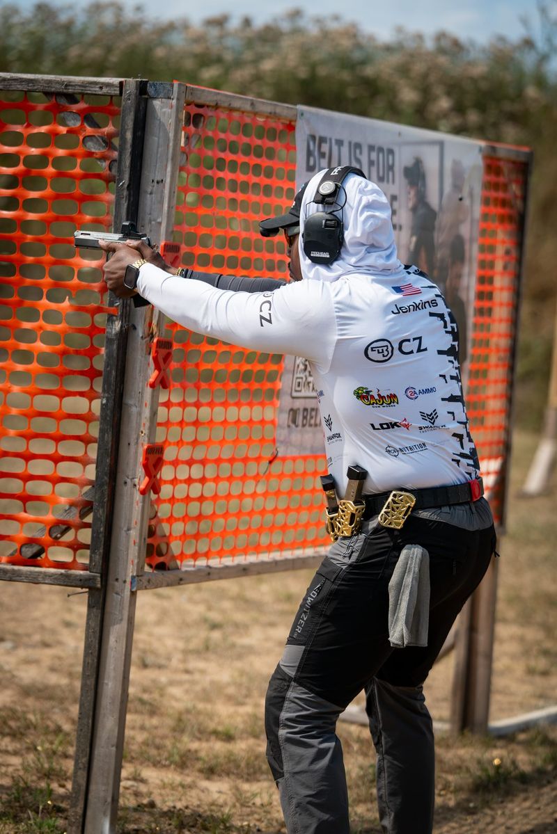 DJ Jenkins engaging a target, back of his sponsor jersey visible with his name and the CZ logo
