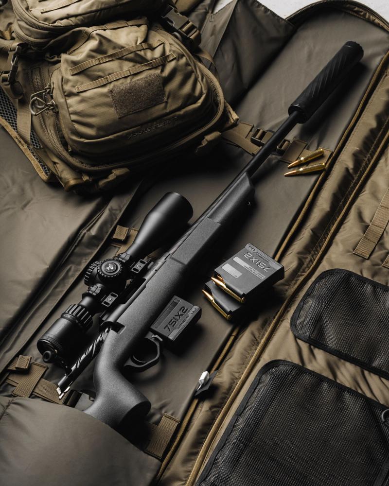 Patriot II mounted on a rifle laying in a range bag