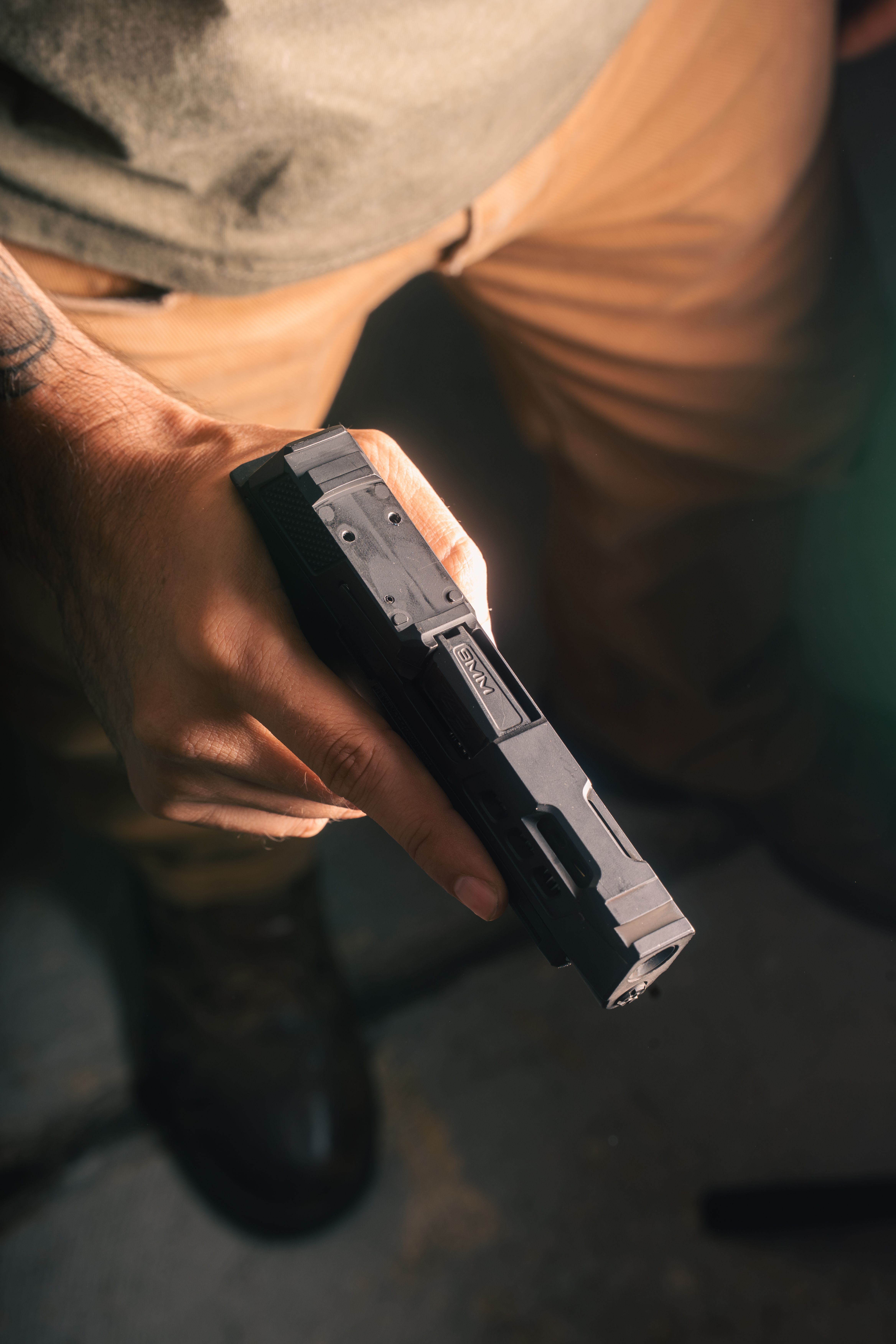Sig P365 with no optic mounted, RMSc optic cut exposed on top of the slide