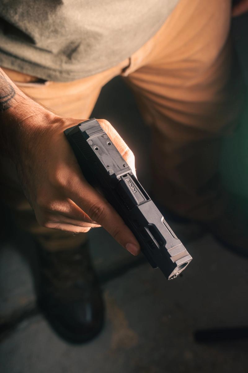 Sig P365 with no optic mounted, RMSc optic cut exposed on top of the slide