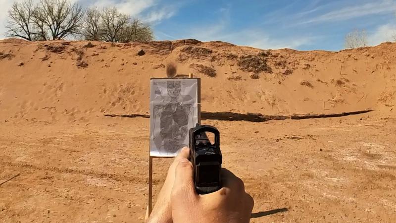 Shooter demonstrating the Mozambique drill at 7 yards