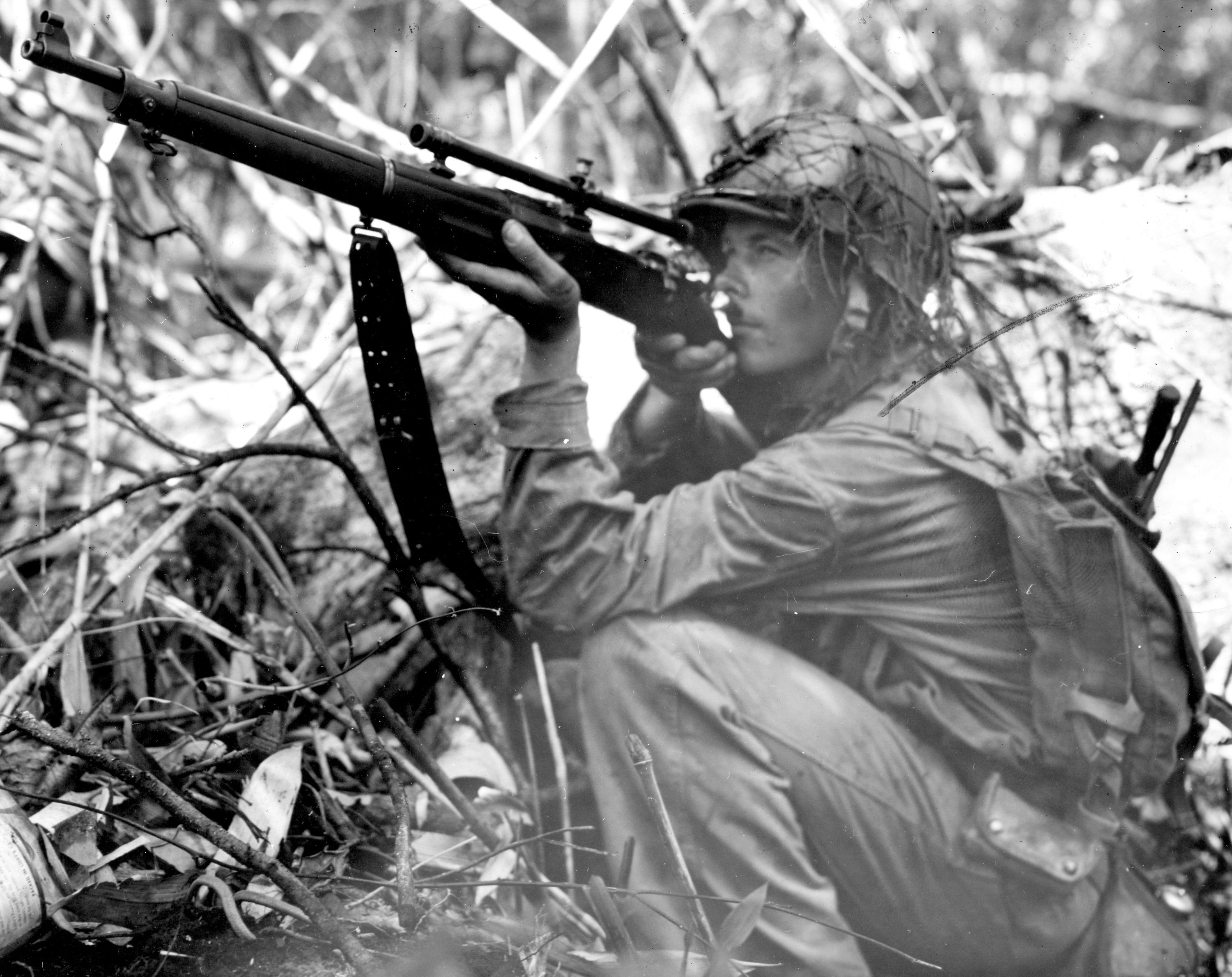 USMC sniper with Lyman 5A scope in World War II, a WWI-vintage optic that went back to war in the Pacific twenty years later