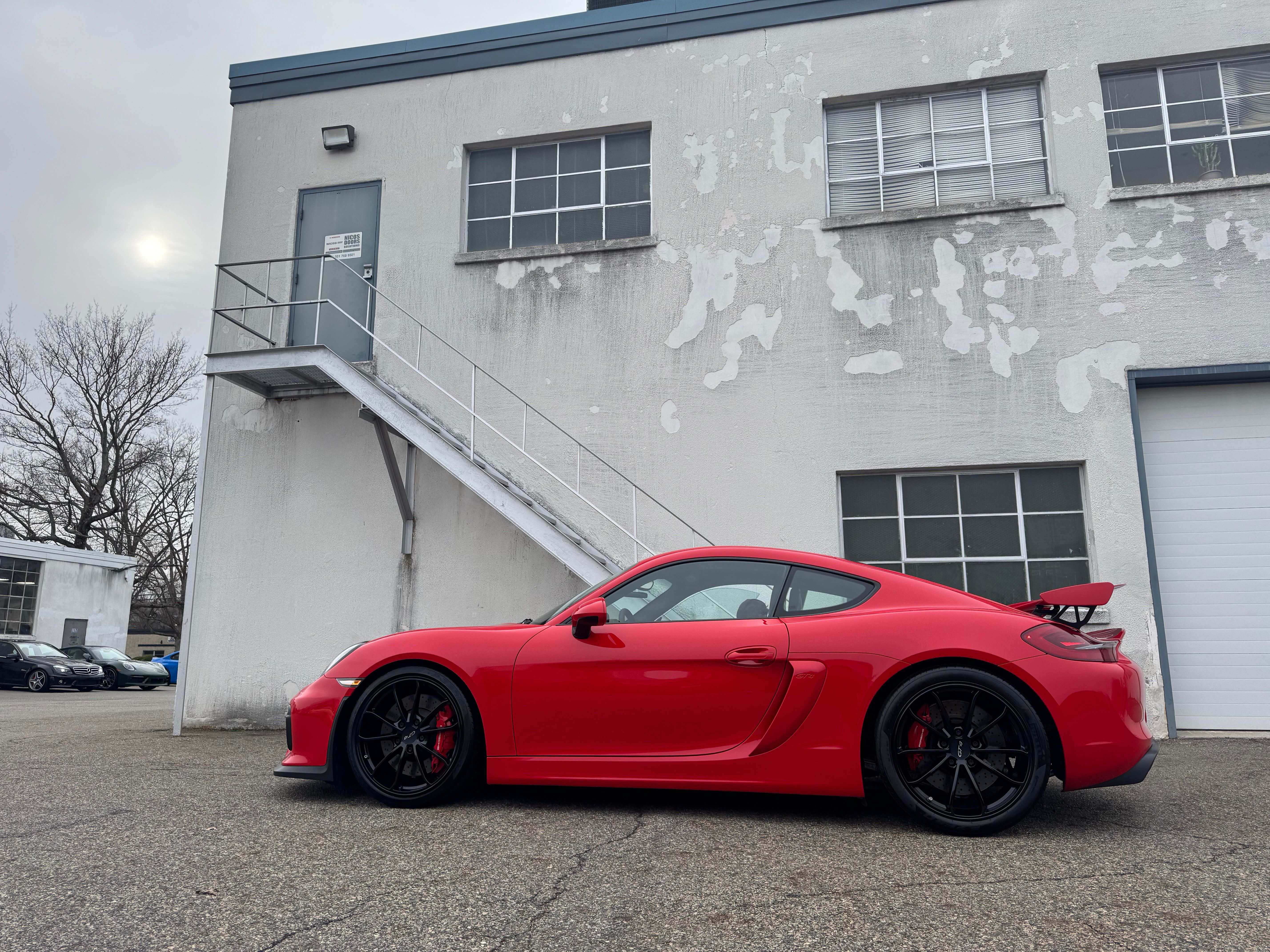 Porsche 981 Cayman GT4 (Guards Red) — finished at Detailer's Domain studio, Norwood NJ