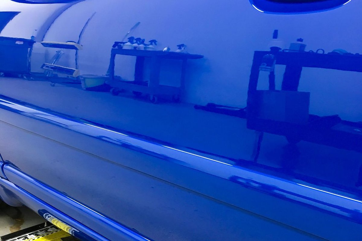 Nogaro Blue Audi S4 door in the Detailer's Domain bay, corrected and coated with Nanolex