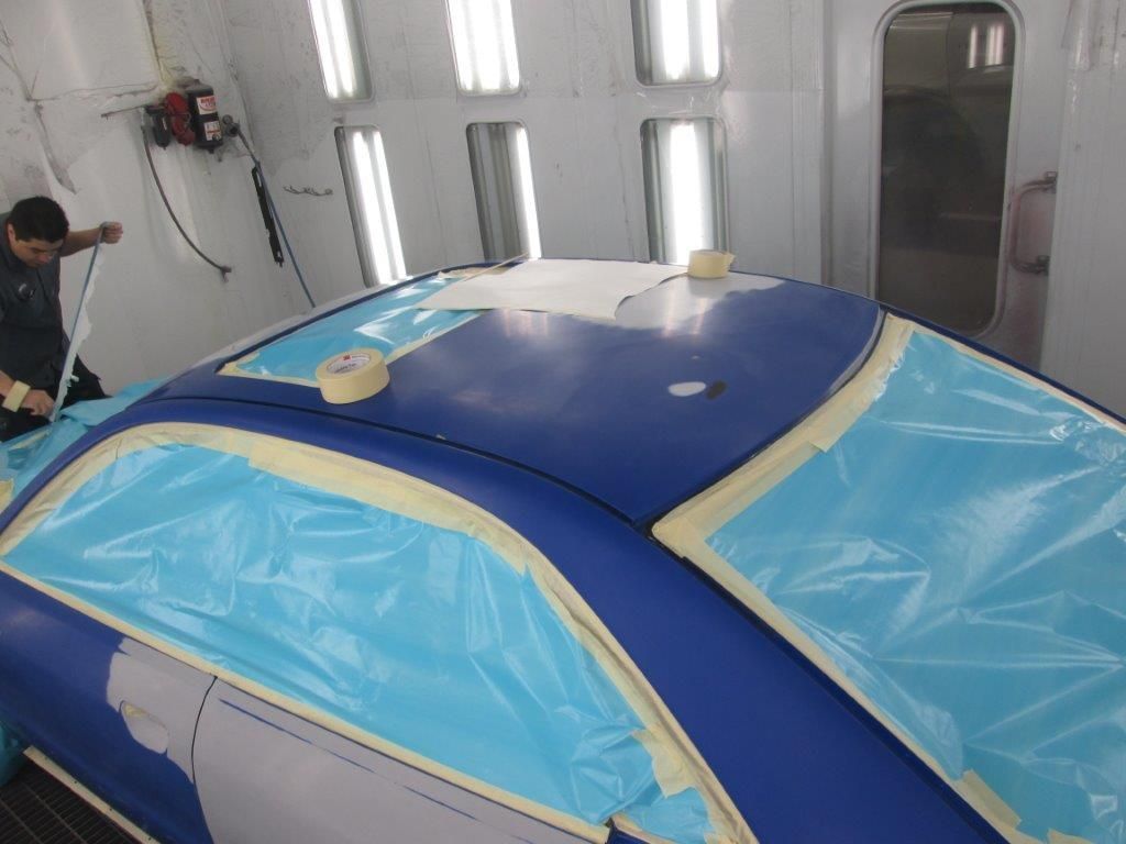 In the paint booth (18)