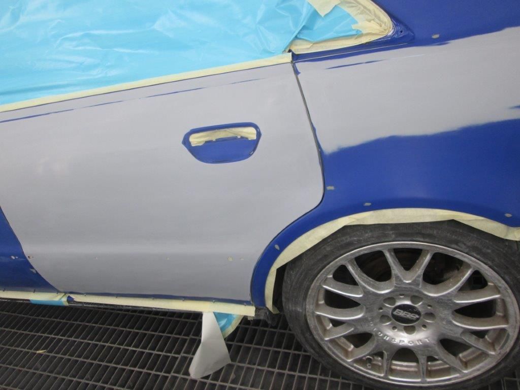 In the paint booth (16)