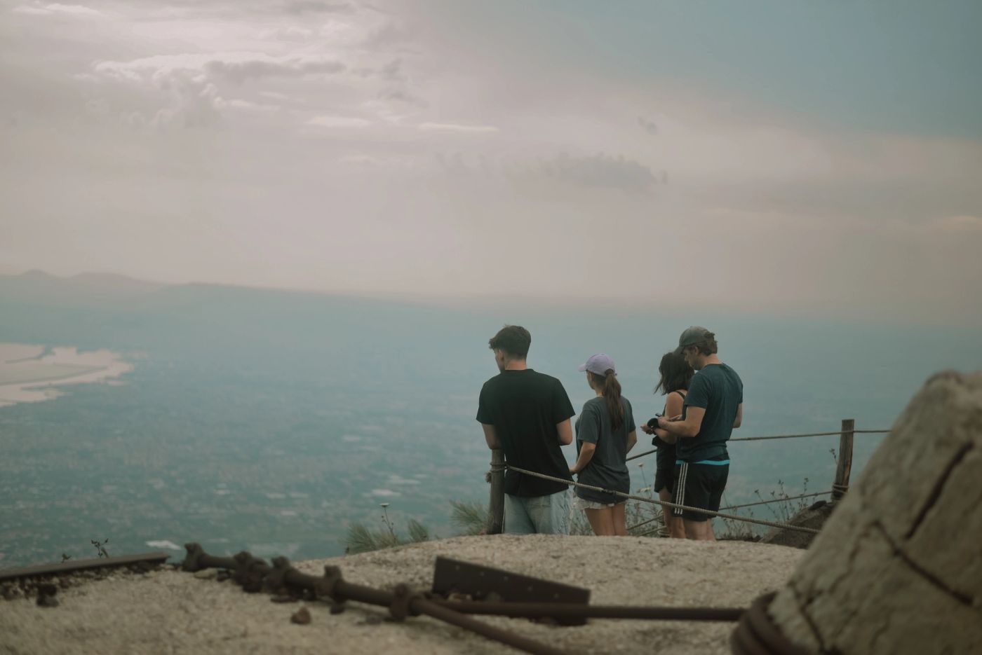 Group admiring the bay from above at dusk