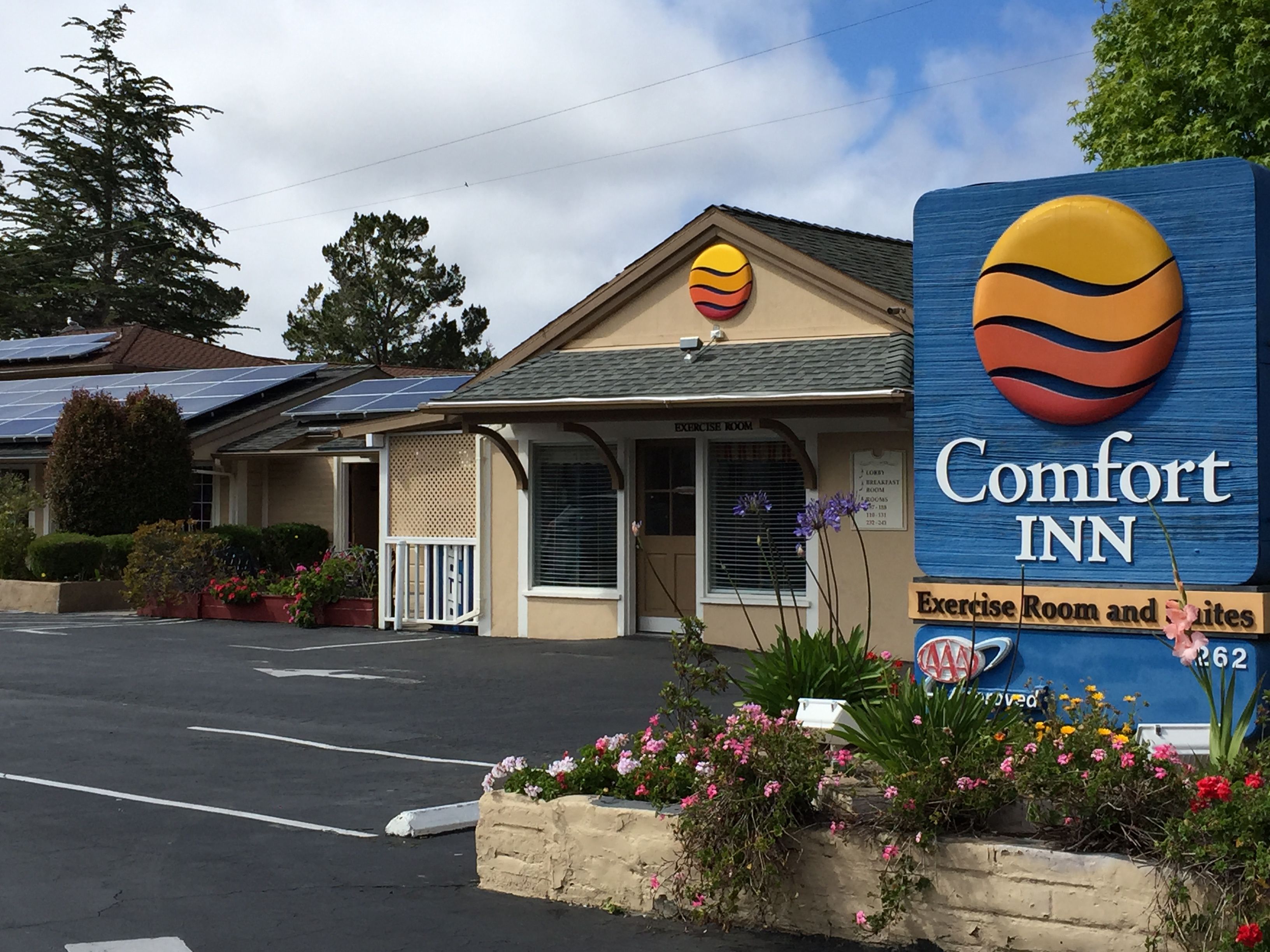 Commercial solar installation at Comfort Inn in Monterey with rooftop panel array