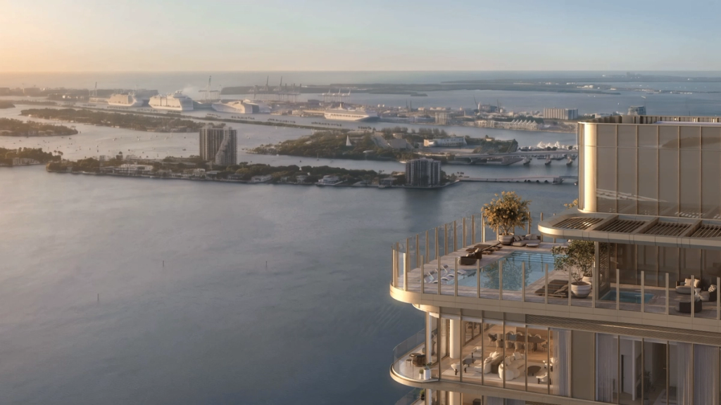 Aerial view of LILLI's rooftop pool terrace overlooking Biscayne Bay and the Port of Miami.