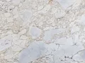 Afyon Gold Mermer breşli desenli altın-krem doğal taş doku görünümü