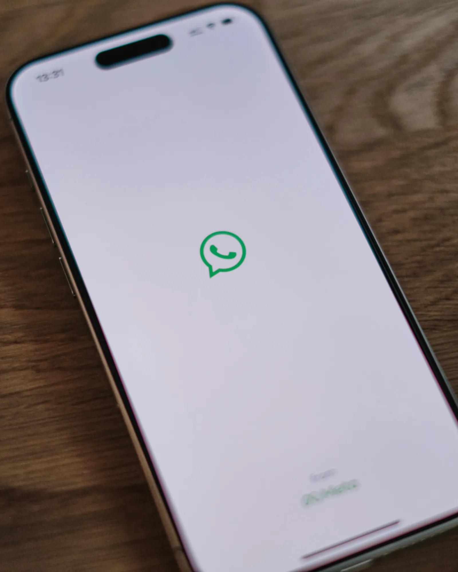 a mobile phone with the WhatsApp app opened