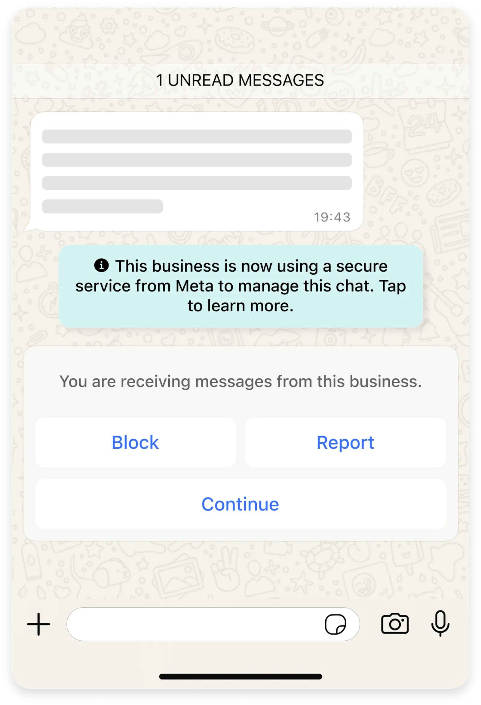 A WhatsApp message displaying the block and report language for unknown senders